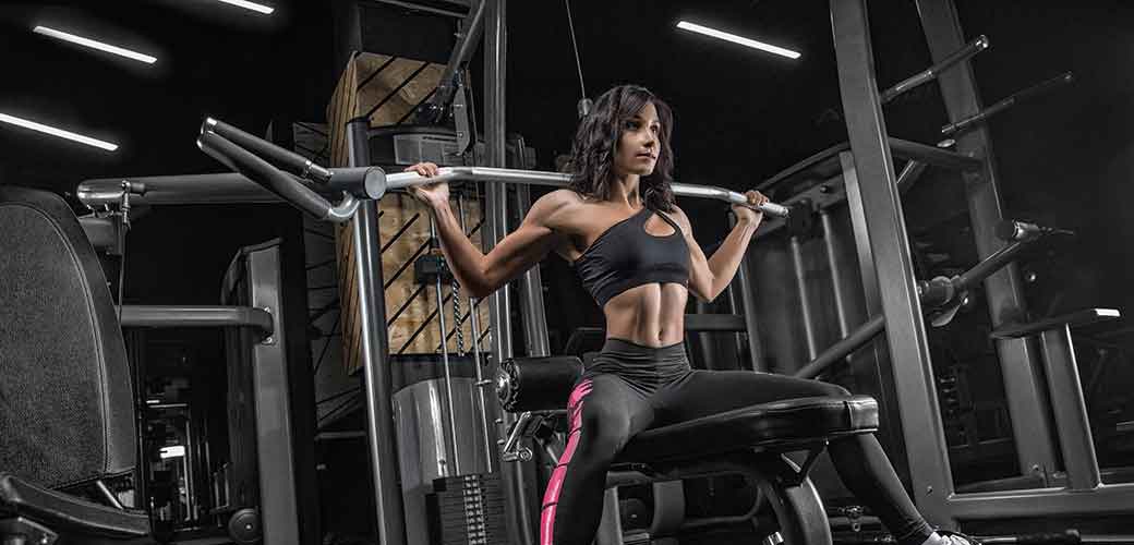 fitness woman in sport wear with perfect sexy fitness body in gym performing. ©romanolebedev - stock.adobe.com, active; adult; arms; sexy; athlete; athletic; barbell; beard; beautiful; beauty; biceps; body; bodybuilder; bodybuilding; care; couple; dark; dumbbell; energy; exercise; fitness; girl; guy; hairstyle; handsome; happy; healthy; lifestyle; man; metal; muscular; naked; people; power; powerful; professional; shirtless; smoke; sport; sportsman; sportswear; strength; strong; studio; torso; training; weight; woman; workout; young